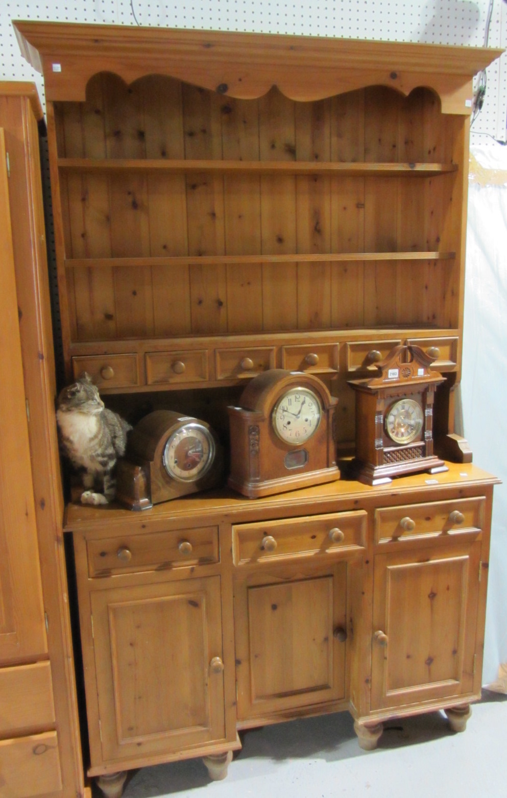 Appraisal: A th century pine dresser with a three tier plate