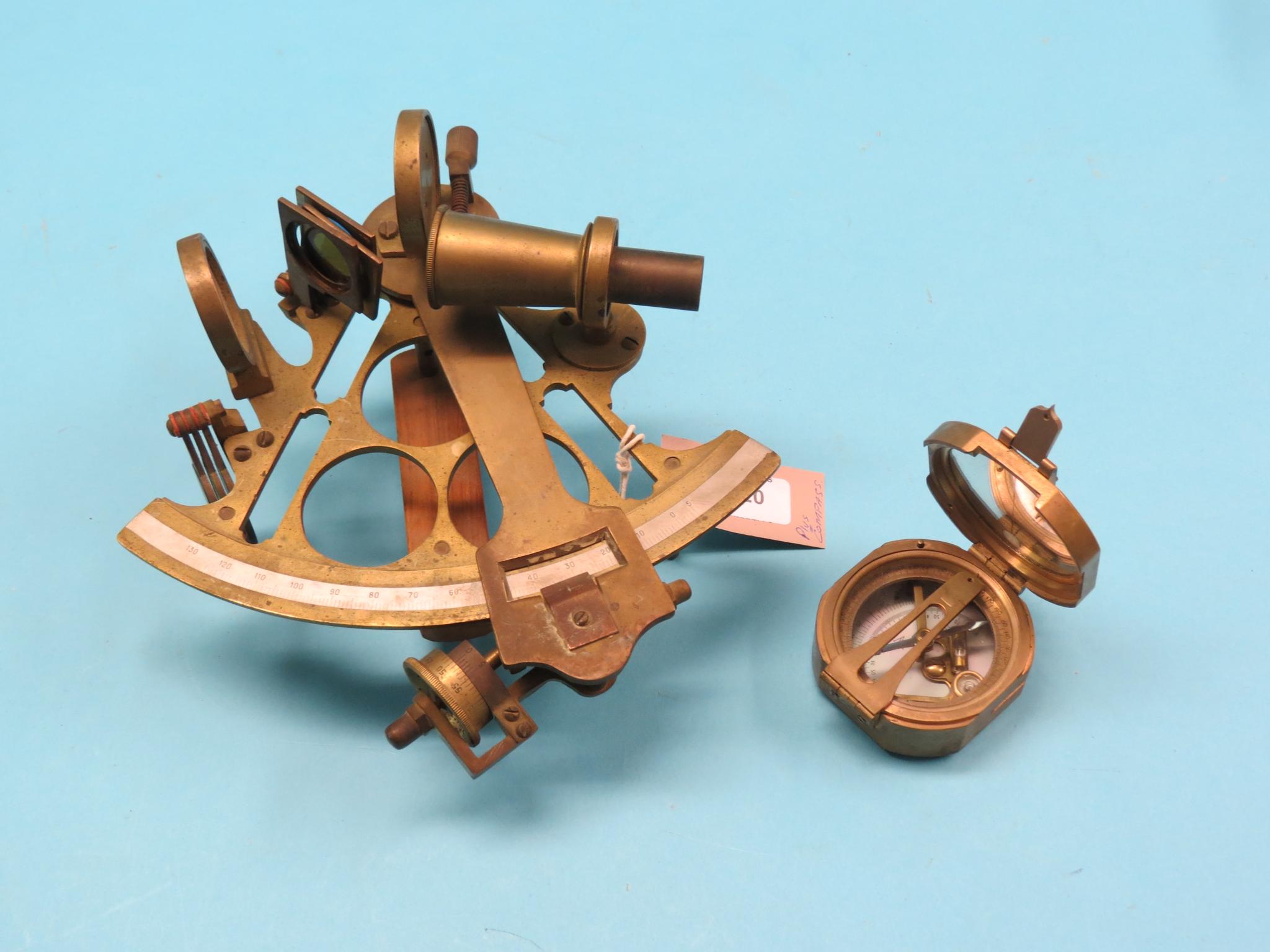 Appraisal: A brass sextant and a brass-cased folding compass