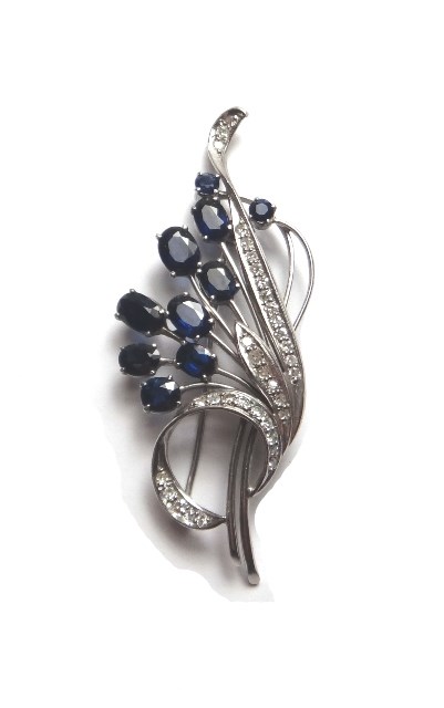 Appraisal: A white gold sapphire and diamond set brooch designed as