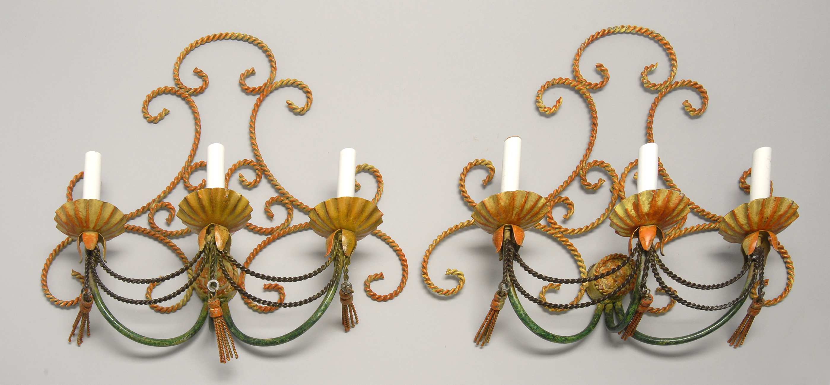 Appraisal: PAIR OF EARLY TH CENTURY DECORATIVE FRENCH WROUGHT IRON SCONCES