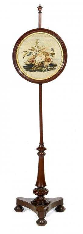 Appraisal: A VICTORIAN MAHOGANY POLE SCREEN the circular woolwork banner of