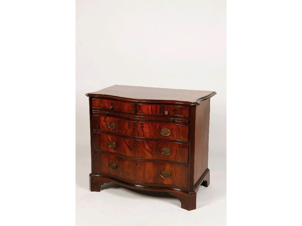 Appraisal: A GEORGE III SERPENTINE FRONTED CHEST OF DRAWERS the shaped