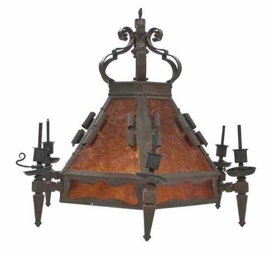 Appraisal: An Arts and Crafts Wrought Iron Chandelier having a scrolling