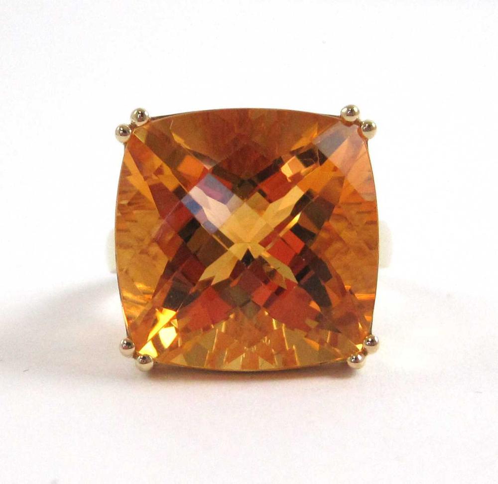 Appraisal: CITRINE AND FOURTEEN KARAT GOLD RING set with a single