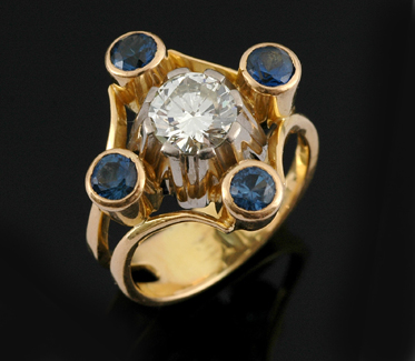 Appraisal: A diamond and sapphire cocktail ring The round brilliant cut