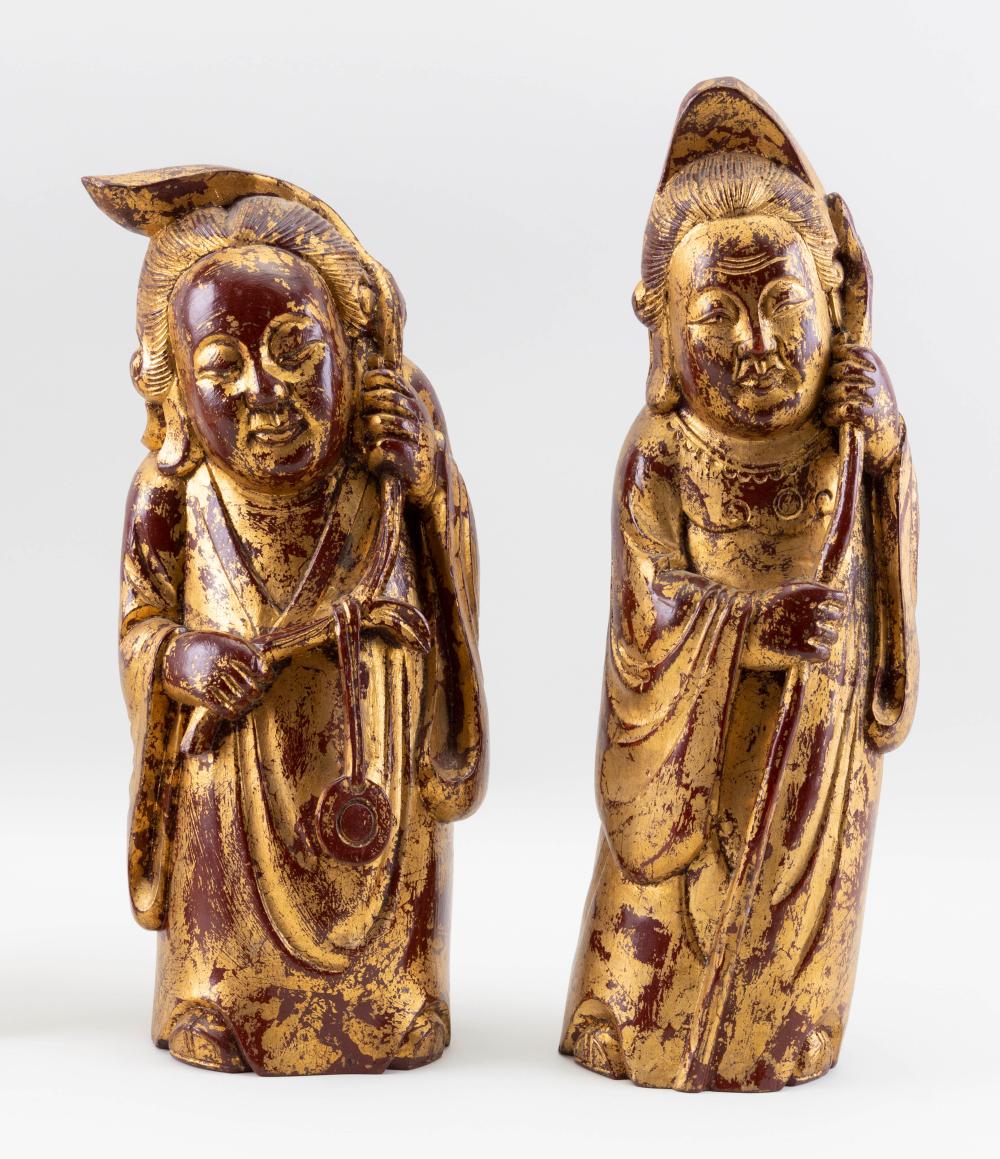 Appraisal: PAIR OF CHINESE RED AND GILT LACQUERED WOOD DEITY FIGURES