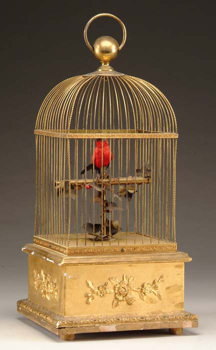 Appraisal: FRENCH MUSIC BOX BIRDCAGE WITH A SINGLE BIRD The square-domed