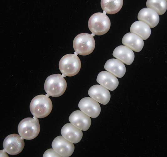 Appraisal: TWO SINGLE STRAND WHITE PEARL NECKLACES including an inch necklace