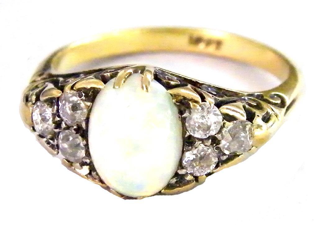 Appraisal: ct opal ring set with six diamonds to the shoulders