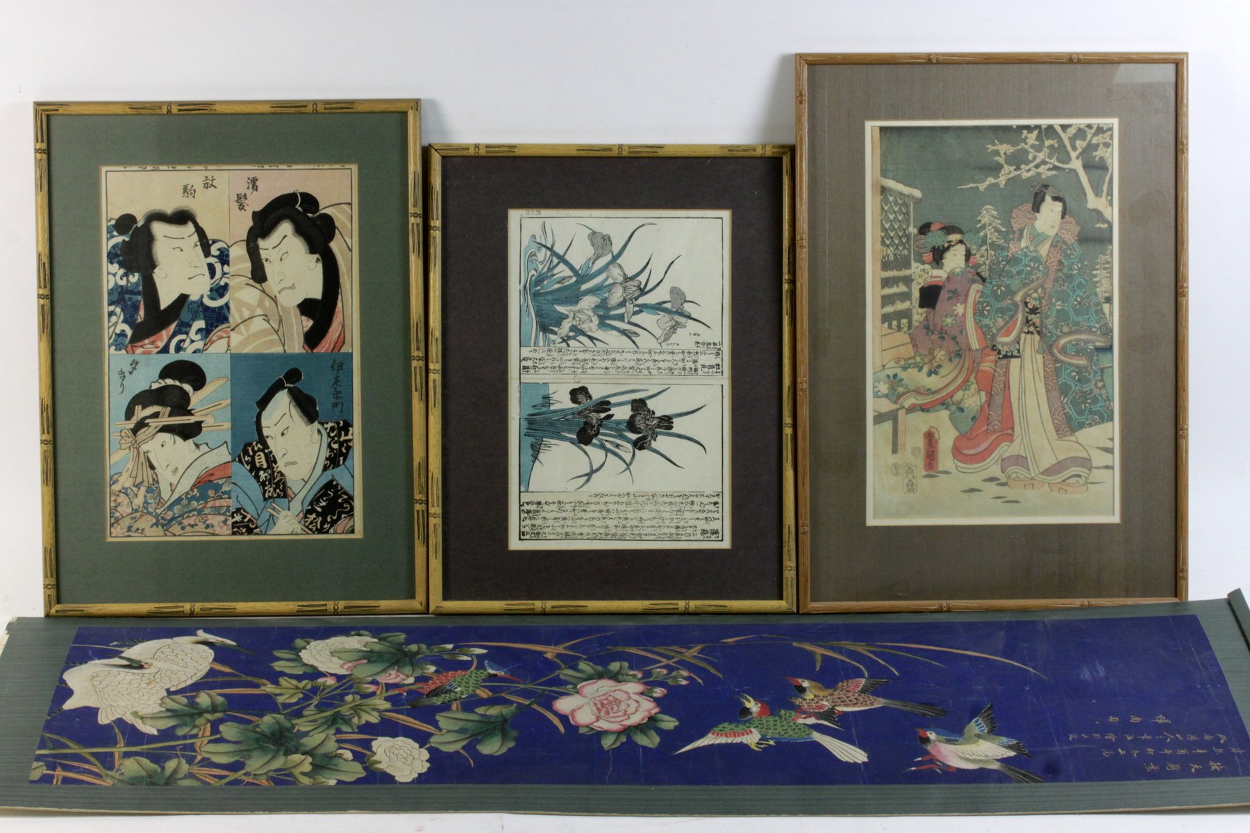 Appraisal: Three Japanese woodblock prints and a printed scroll picture of