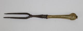 Appraisal: th century European iron bronze fork th century European iron