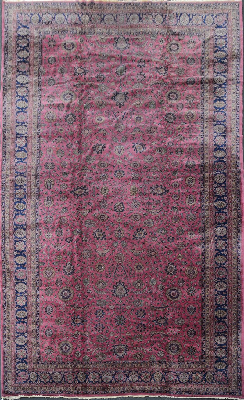 Appraisal: PERSIAN CARPET The central section woven as a flied of