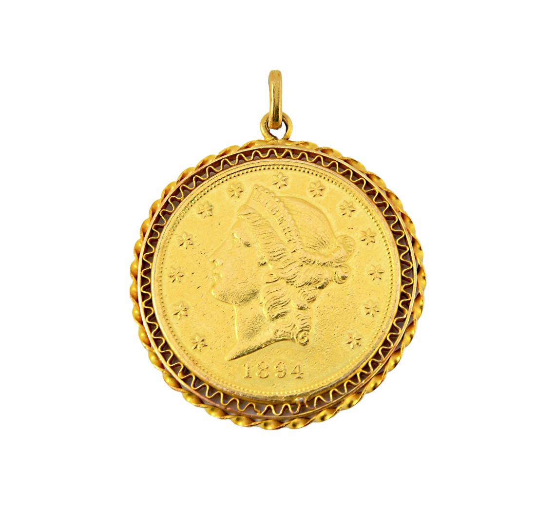 Appraisal: A U S A gold twenty dollars in a gold