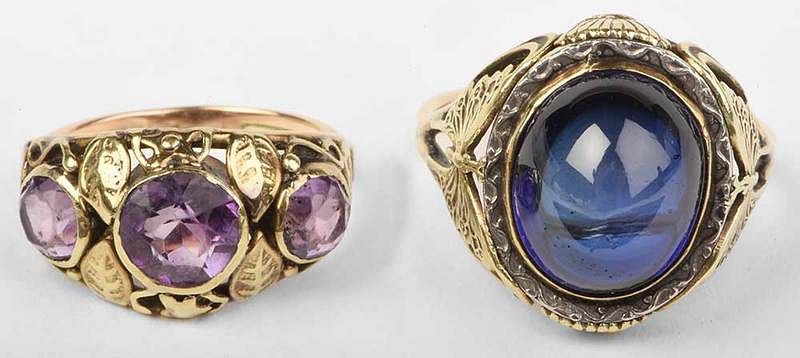 Appraisal: Two Antique kt Rings butterfly design oval synthetic blue sapphire