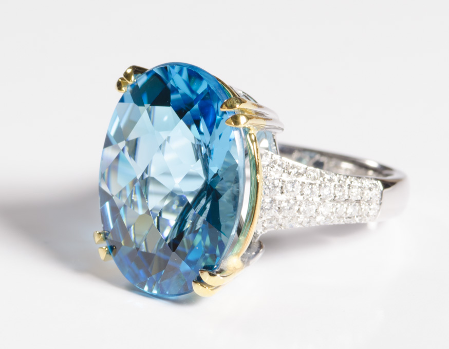 Appraisal: BLUE TOPAZ DIAMOND AND FOURTEEN KARAT GOLD RING a white