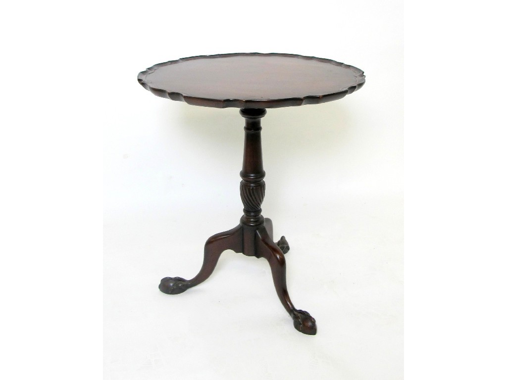 Appraisal: A late th Century tripod table the circular snap top