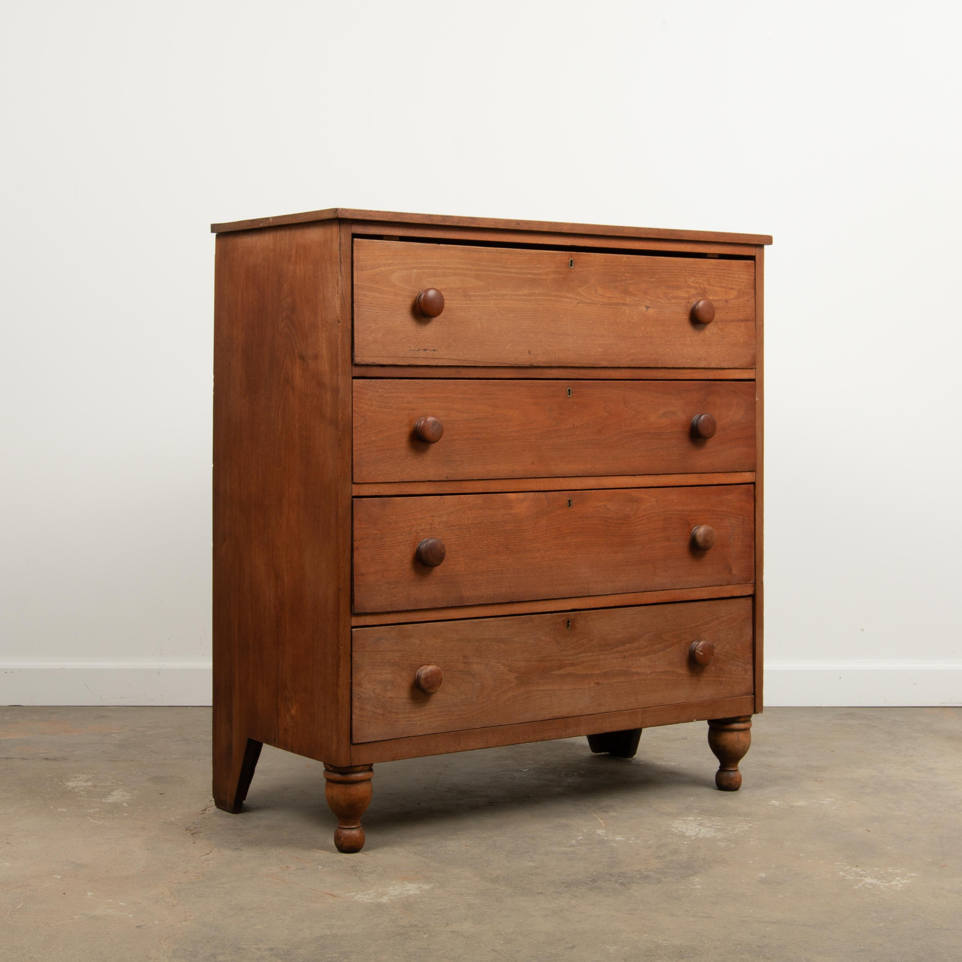 Appraisal: MISSOURI WALNUT FOUR DRAWER CHEST TH C Missouri walnut four