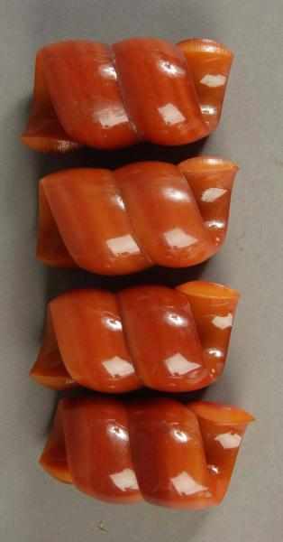 Appraisal: Lot of Butterscotch Bakelite Napkin Rings Description Unusual napkin rings