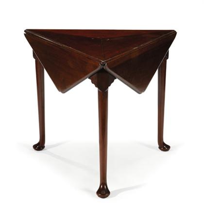 Appraisal: Queen Anne style mahogany handkerchief table th century The triangular