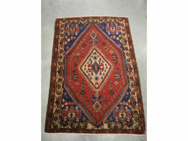 Appraisal: Hamadan Persian Handmade Rug large medallion reds blues ivory '