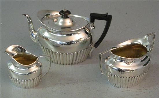 Appraisal: Victorian silver three piece tea service of oval form with