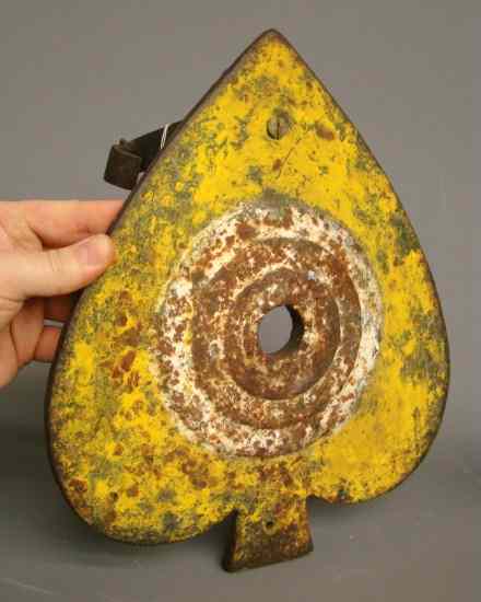 Appraisal: Early painted cast iron spade form shooting gallery target ''