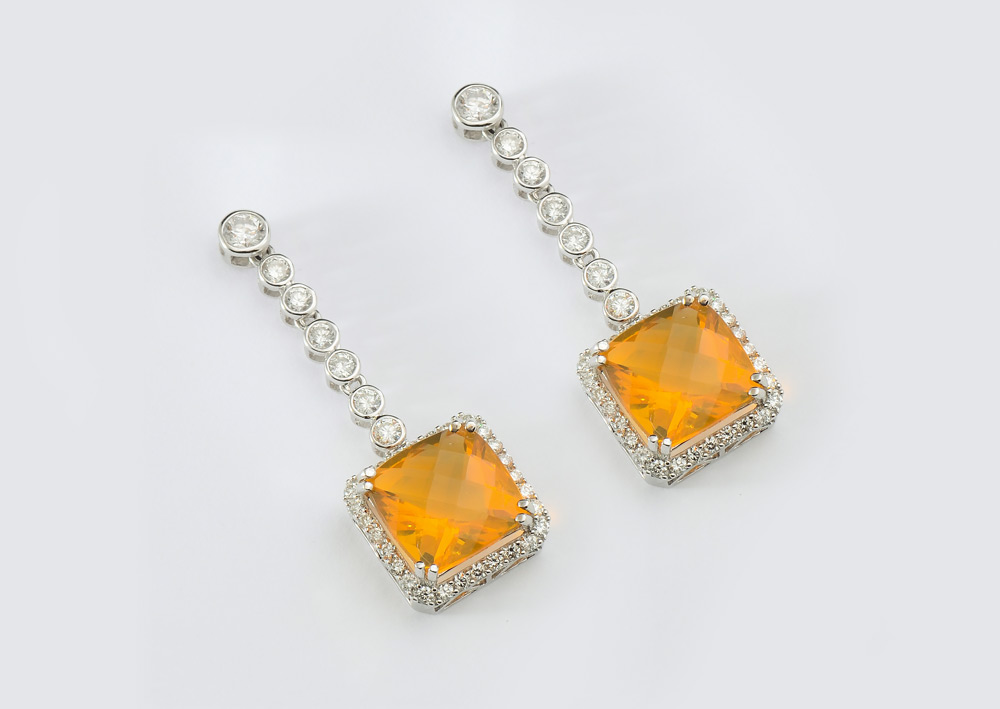 Appraisal: K FIRE OPAL AND DIAMOND DANGLE EARRINGS K white gold