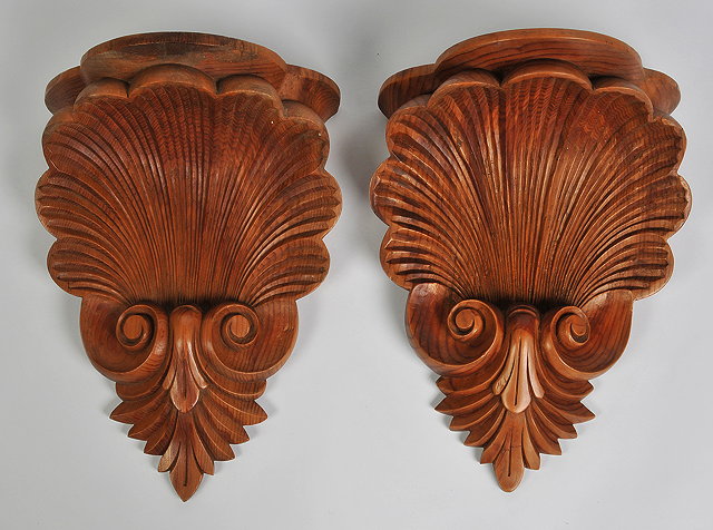 Appraisal: A PAIR OF PINE WALL BRACKETS each in the form