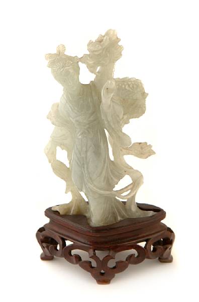 Appraisal: A small Chinese light green jadeite maiden height in