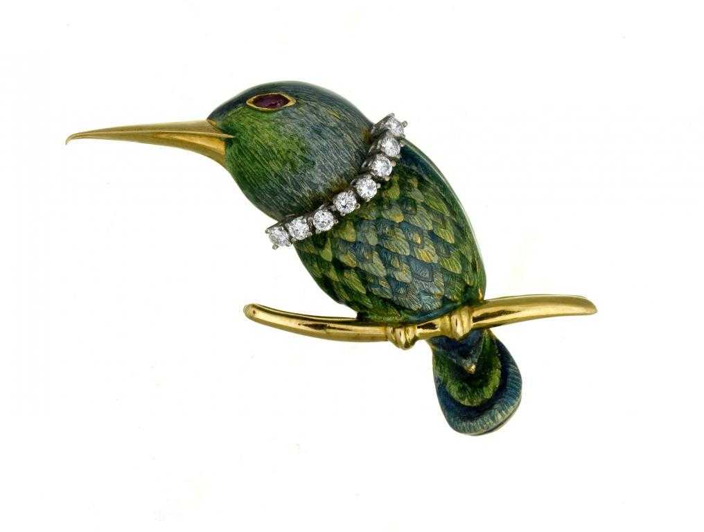 Appraisal: A DIAMOND RUBY GOLD AND TRANSLUCENT ENAMEL BIRD OF PARADISE