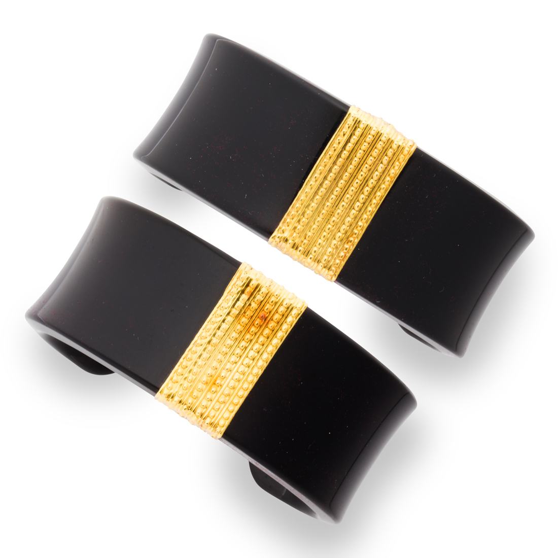 Appraisal: A PAIR OF BLACK CHALCEDONY AND EIGHTEEN KARAT GOLD BRACELETS