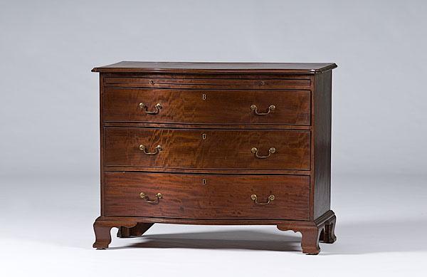 Appraisal: GEORGE III BACHELOR'S CHEST OF DRAWERS English mahogany serpentine front