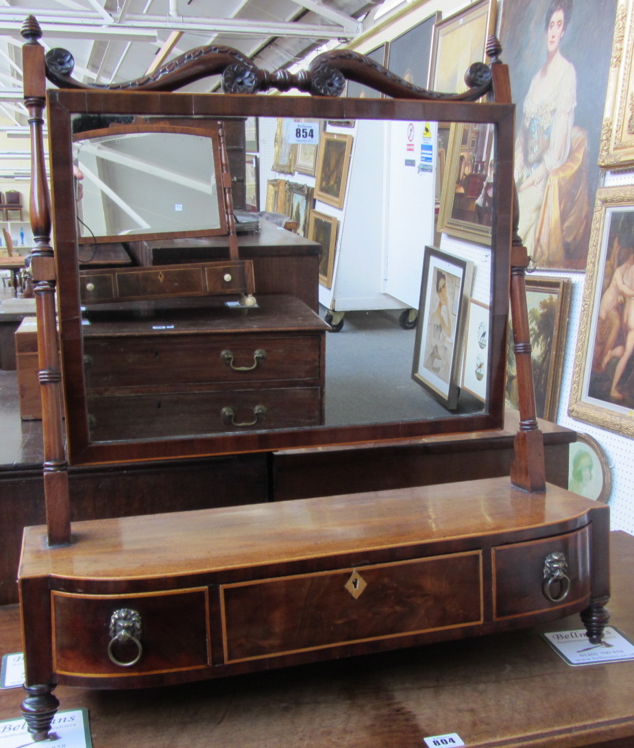 Appraisal: An early Victorian inlaid mahogany swing frame toilet mirror with