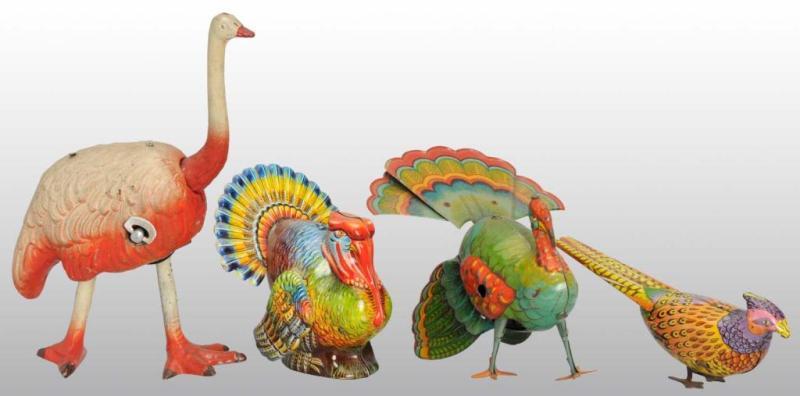 Appraisal: Lot of Pheasant Turkey Wind-Up Toys Description American and German