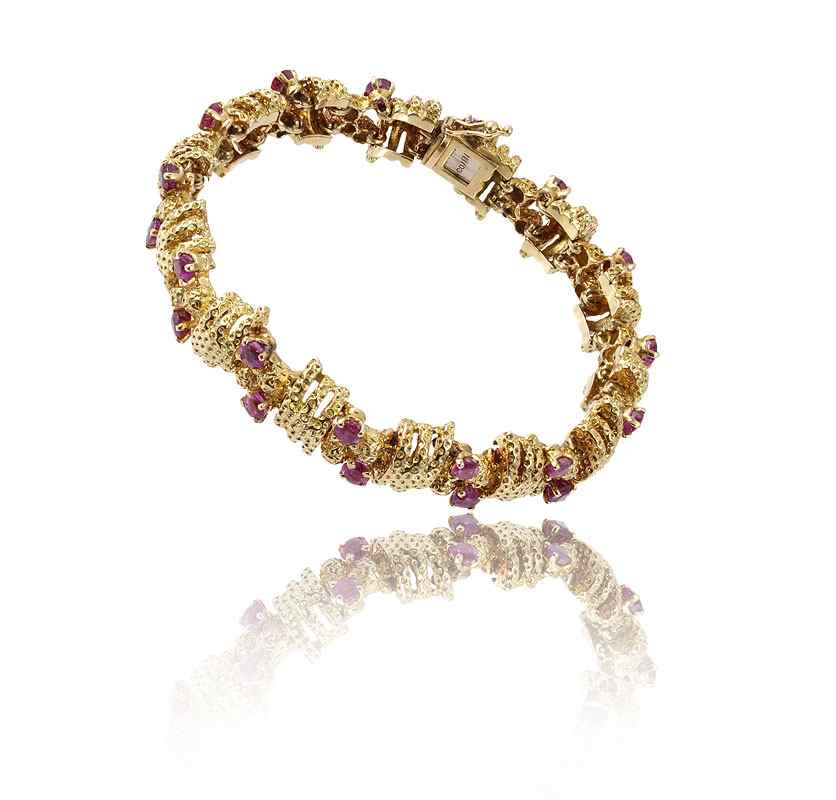 Appraisal: TIFFANY CO RUBY BRACELET round shaped mixed cut rubies set