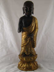 Appraisal: A large bronze finished spelter figure of Buddha right hand