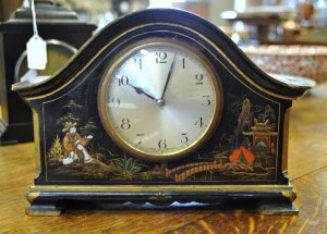 Appraisal: A lacquered Oriental decorated mantel clock with eight day English