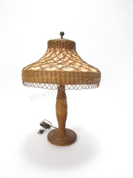 Appraisal: A vintage wicker table lamp damaged with green glass finial