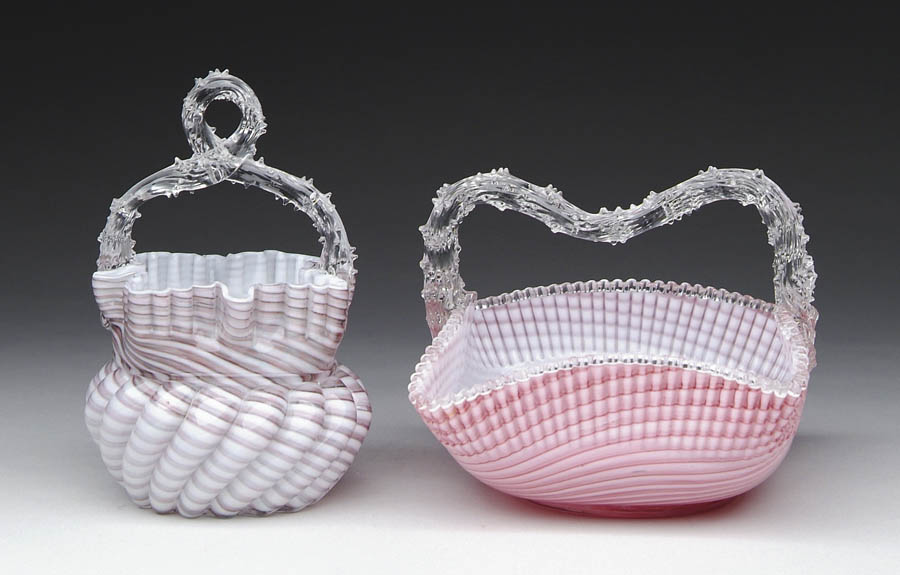 Appraisal: TWO VICTORIAN BASKETS Pink and white swirled design with tightly