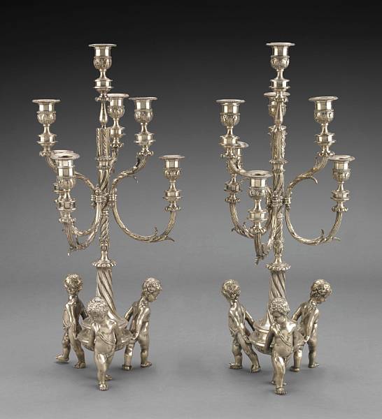 Appraisal: A pair of French silvered bronze seven light candelabra circa