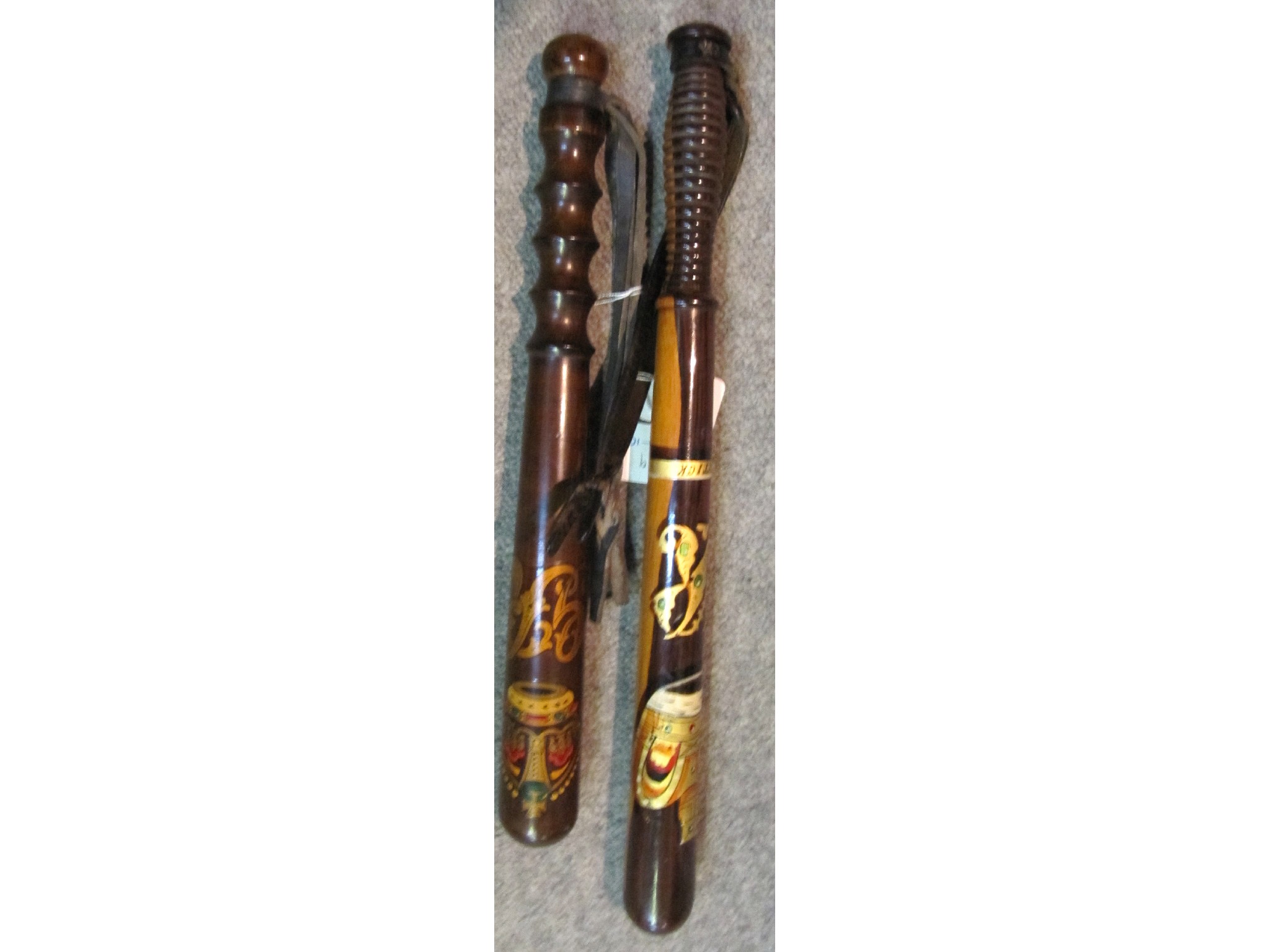 Appraisal: A lot comprising two truncheons one marked Partick