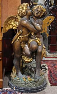 Appraisal: Bronze figural sculpture depicting Cupid romancing Pysche Bronze figural sculpture