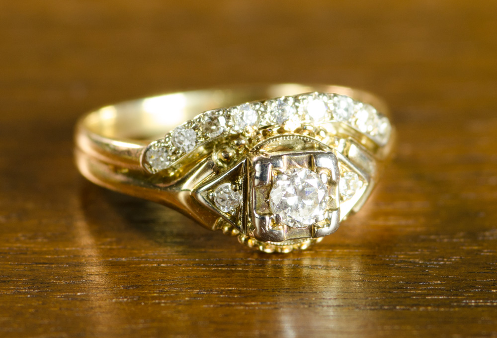 Appraisal: DIAMOND AND FOURTEEN KARAT GOLD RING appearing as two rings