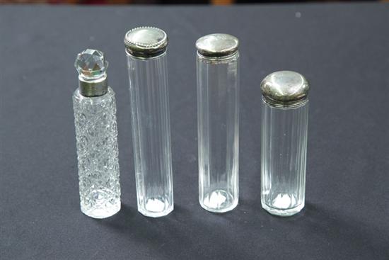 Appraisal: FOUR GLASS AND SILVER DRESSER BOTTLES Three for powders one