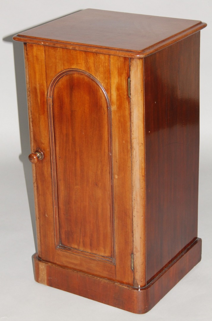 Appraisal: A Victorian mahogany pot cupboard the rectangular moulded overhanging top