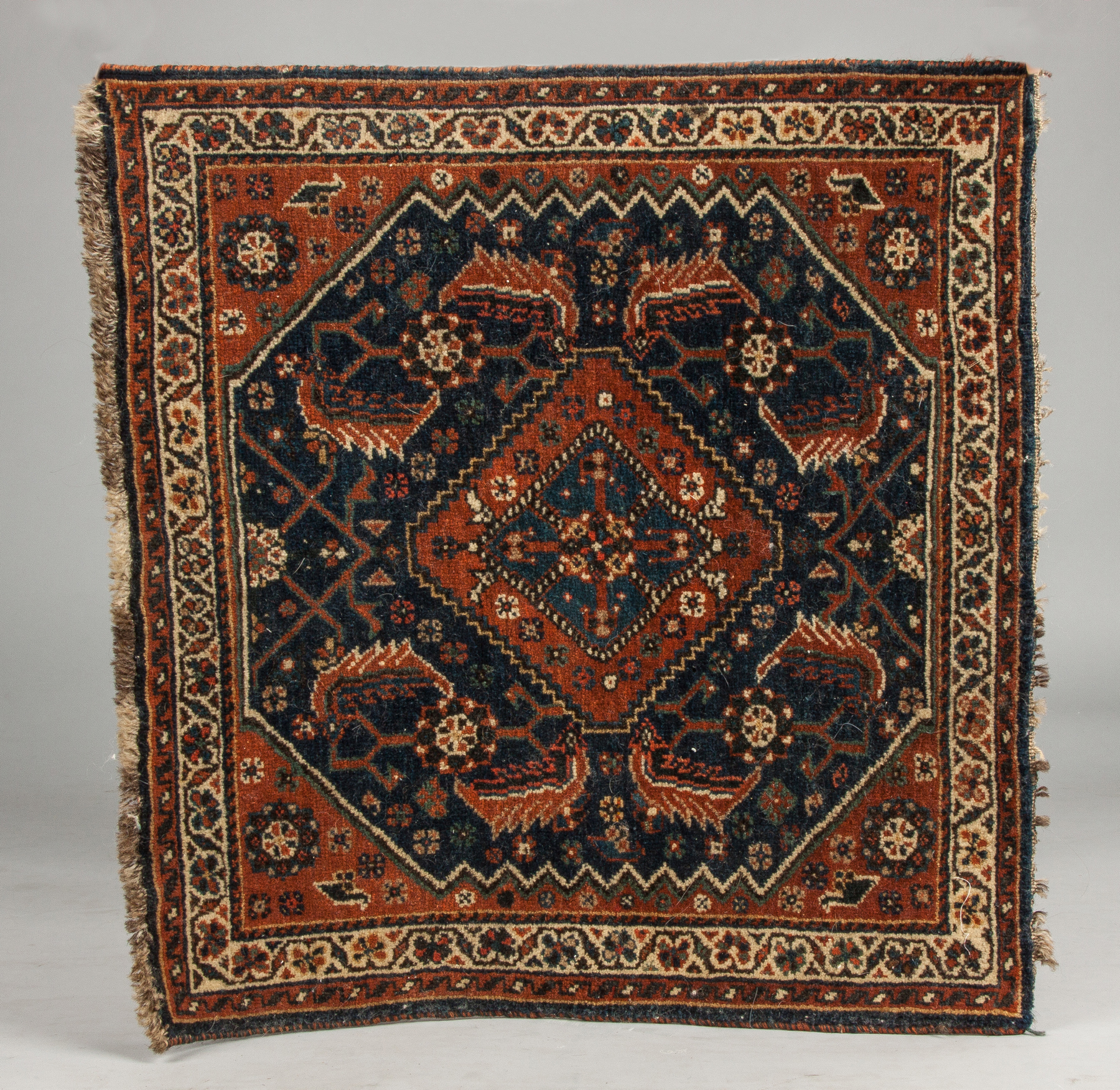 Appraisal: Four Persian Mats Two matching