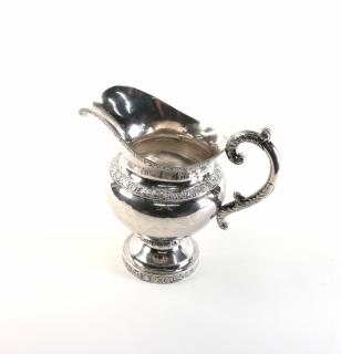 Appraisal: Geoff New York Silver pitcher with raised shell and leaf