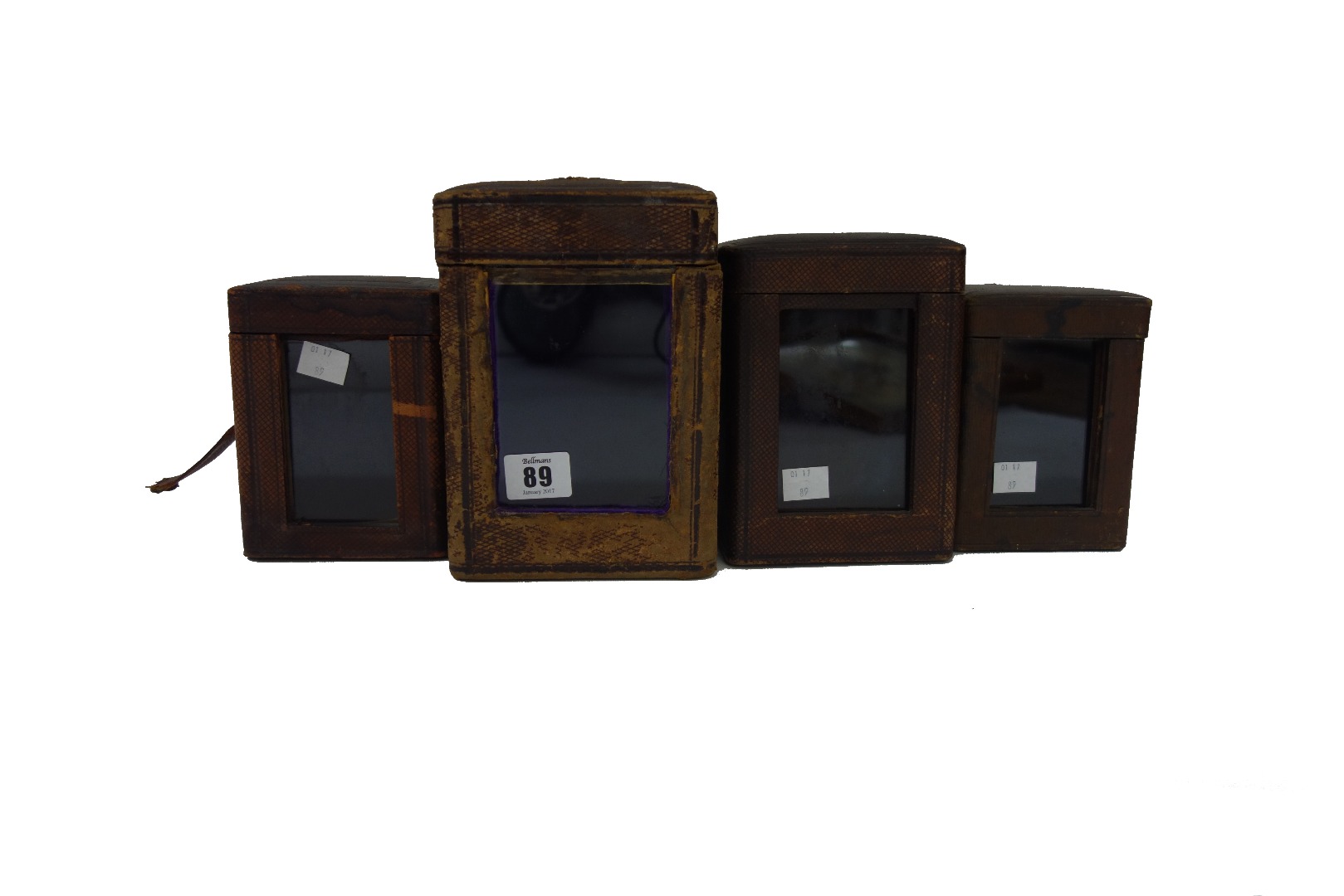 Appraisal: Four late Victorian leather covered carriage clock cases of varying