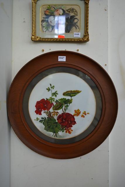 Appraisal: HAND PAINTED FLORAL SCENE ON MILK GLASS IN CIRCULAR FRAME