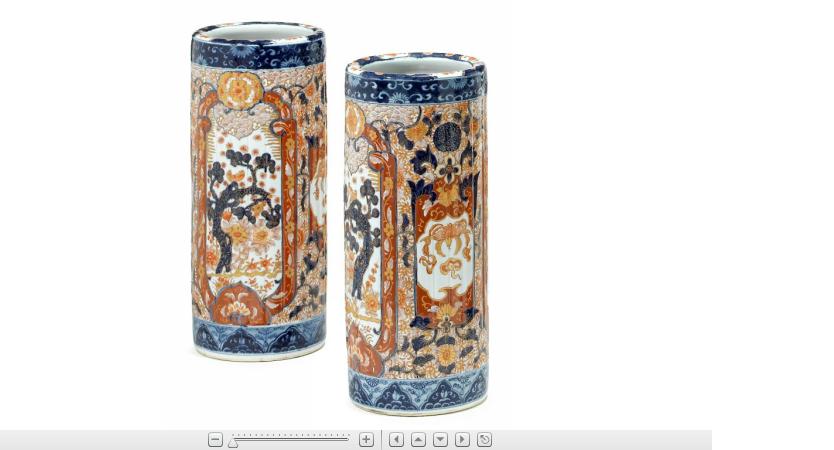 Appraisal: Pair of Imari porcelain umbrella standsTall lobed cylindrical form underglazed